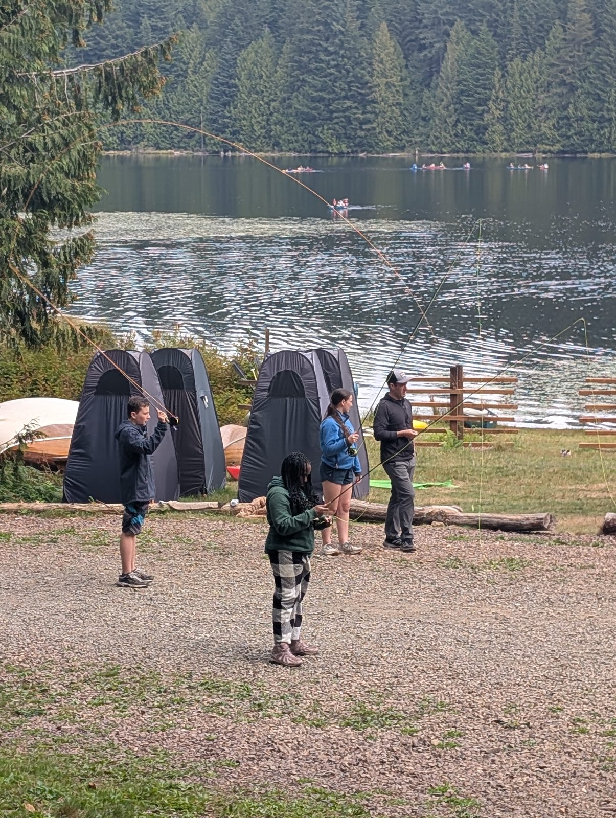 Tents set up beside the lake at Camp Hamilton