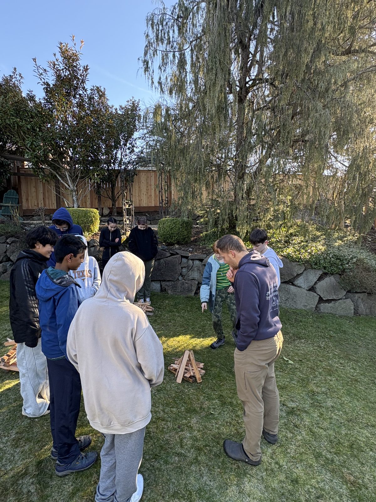 Students working together outdoors during an elective